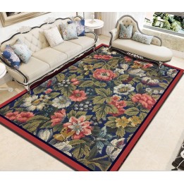 Tapis sol fleur sur fond bleu foncé bord rouge aspect ancien
