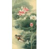 Coupe de canard mandarin dans l'étang avec les lotus