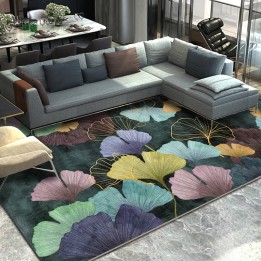 Feuilles multicolores de l'abricotier d'argent sur fond vert foncé