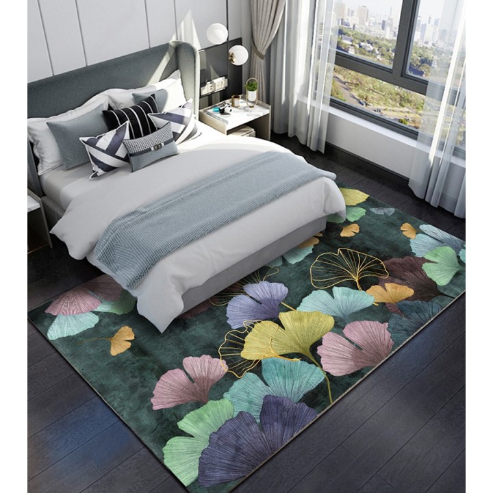 Feuilles multicolores de l'abricotier d'argent sur fond vert foncé