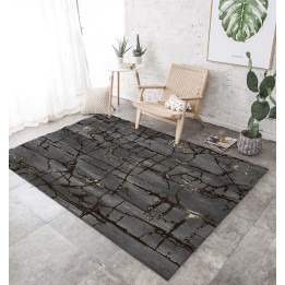 Tapis noir contemporain traits abstraits avec taches dorées