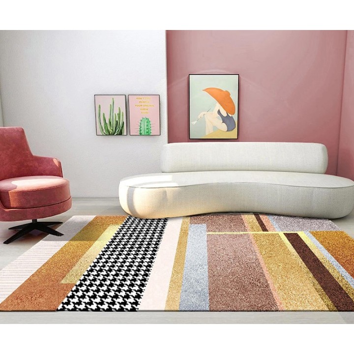 Tapis doré ton orange inspiré de la haute couture, motif pied-de-poule intégré