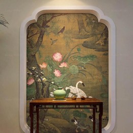 Les oies et les canards dans l'étang avec les lotus