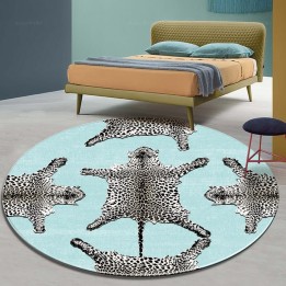 Tapis rond motif félin - Les panthères sur fond bleu pastel