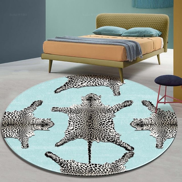 Tapis rond motif félin - Les panthères sur fond bleu pastel