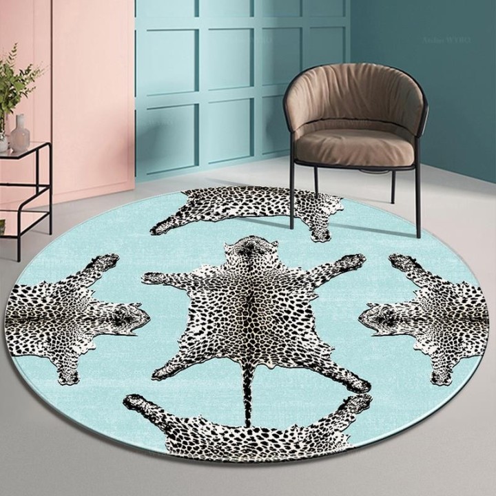 Tapis rond motif félin - Les panthères sur fond bleu pastel