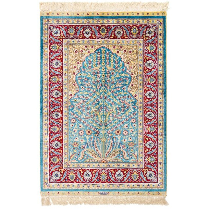 tapis de prière en soie naturelle noué à la main.