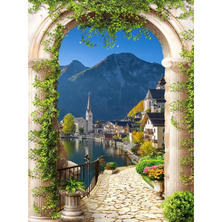Décor mural : panneau imprimé arche avec vue sur village et montagne