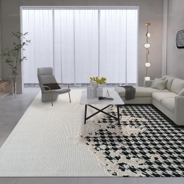 Tapis beige nuage en relief pied-de-poule noir en laine et soie fait main