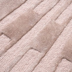 Tapis rond rose pâle poétique, en laine et soie surface en relief