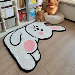 Tapis design ludique gros lapin blanc dans une salle de jeu pour enfant.