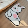 Idée décoration chambre d'enfant, tapis descente de lit en forme de lapin.