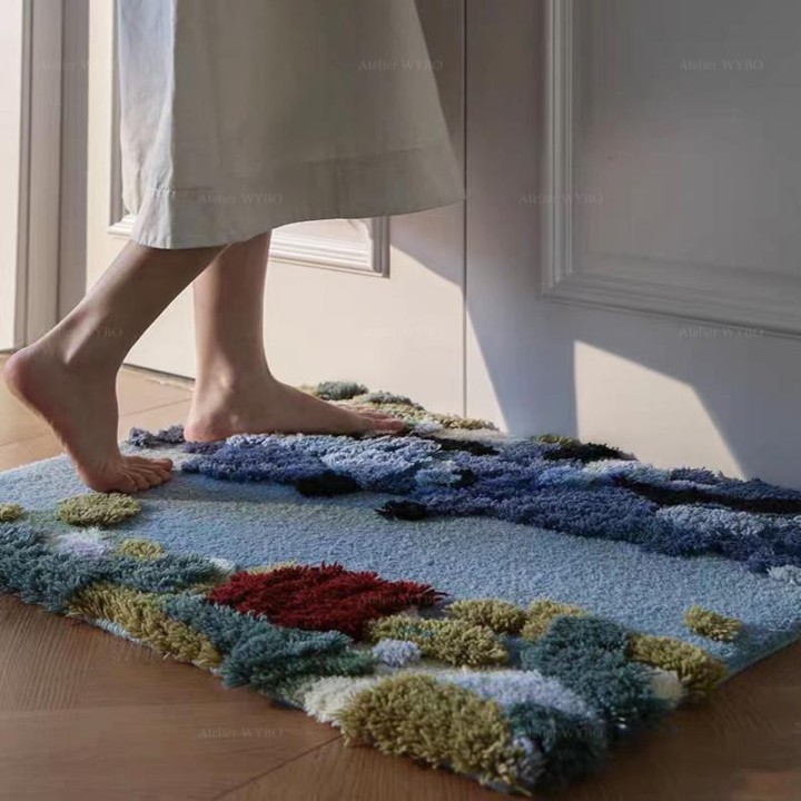 Petit tapis salon séjour chambre, surface en relief, ton bleu avec différentes nuances.