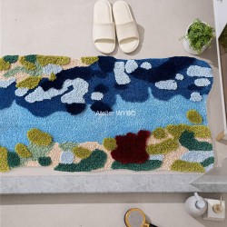 Tapis de bain coloré surface texturée en relief, lavable à la machine.