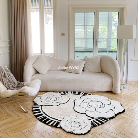 Tapis fleur élégante pour salon séjour et chambre, forme ronde courbe libre.