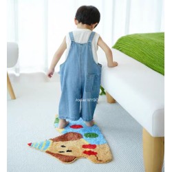 décorer une chambre d'enfant avec un tapis amusant en forme de chien.