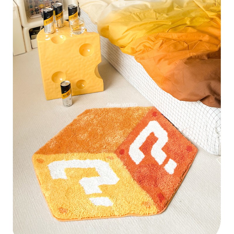 Tapis trompe-l’œil cube Jaune et point d’interrogation, il apporte un style contemporain à la décoration de votre chambre.