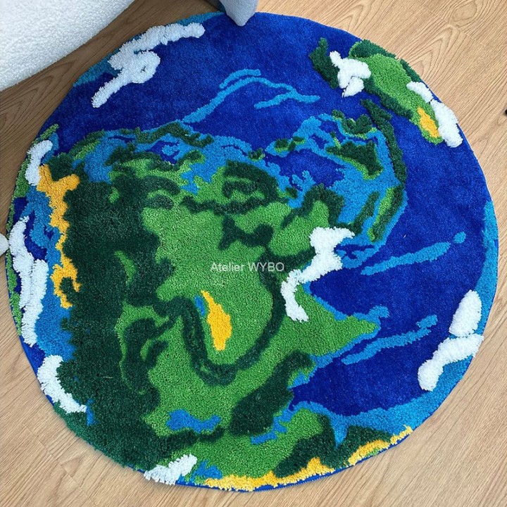 Tapis bleu planète terre, décoration originale combinant nature, créativité et douceur.