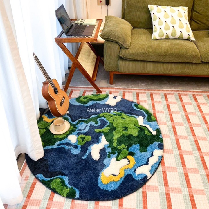 Tapis artistique pour séjour, salon, chambre. Sa forme ronde interpréte la Terre vue du dessus.